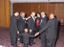 GROOM'S CIRCLE OF LOVE:  Before the ceremony, Lamar is circled by the men in his bridal party.  As he stands in the center, the Fathers of both the Bride & Groom join him with hands placed on his shoulders and is led in prayer by the Bride's Pastor.